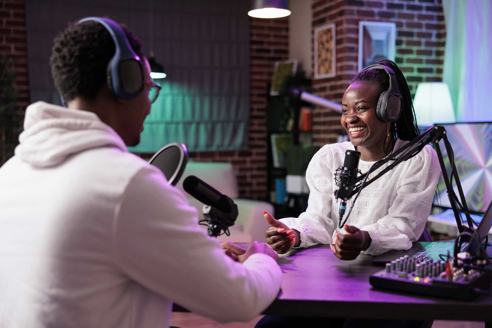 Two podcasters in studio